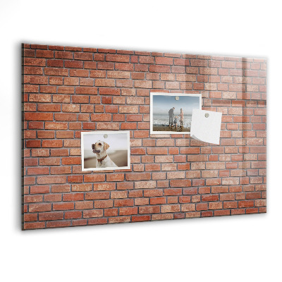 Memobord van glas met print inclusief neodymium magneten Een prikbord aan een bakstenen muur