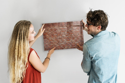 Memobord van glas met print inclusief neodymium magneten Een prikbord aan een bakstenen muur