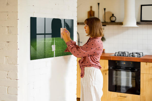 Memobord van glas met print inclusief neodymium magneten Een notitiebord op een groene achtergrond.
