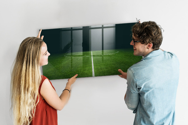Memobord van glas met print inclusief neodymium magneten Een notitiebord op een groene achtergrond.