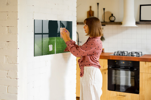 Memobord van glas met print inclusief neodymium magneten Een notitiebord op een groene achtergrond.