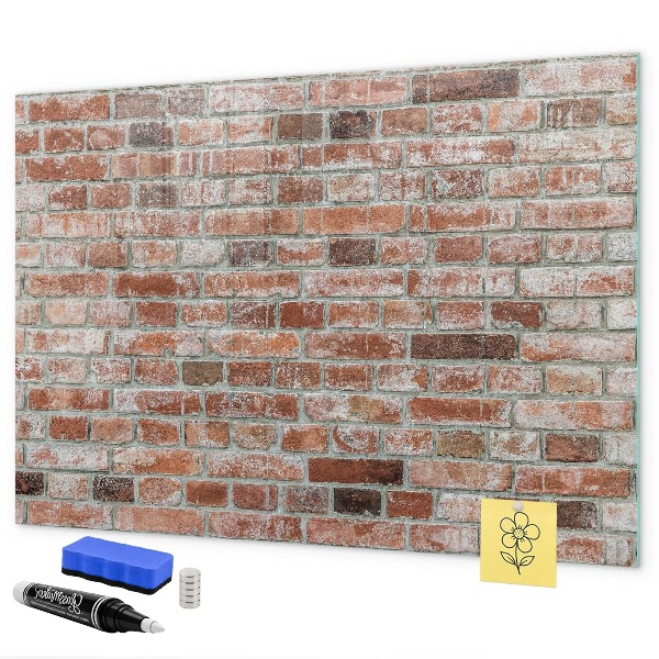 Fotobord op een bakstenen muur