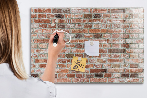 Memobord van glas met print inclusief neodymium magneten Fotobord op een bakstenen muur