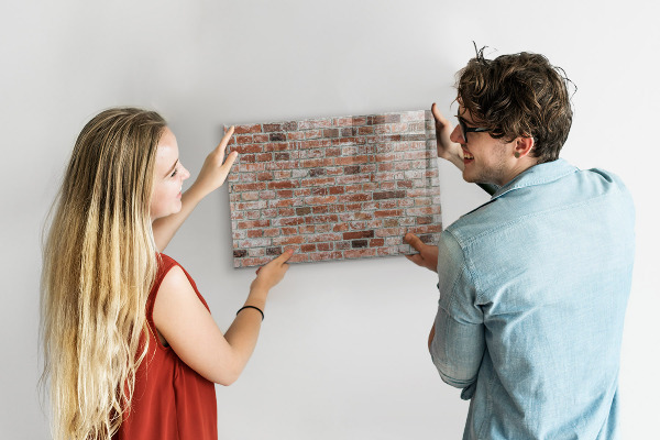 Memobord van glas met print inclusief neodymium magneten Fotobord op een bakstenen muur