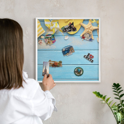 Magnetisch bord van metaal in een witte lijst Strandsfeer