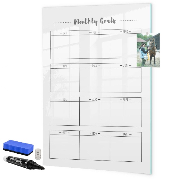 Decoratief glazen wandbord beschrijfbaar en magnetisch Maandelijkse doelen met de mogelijkheid om ze te personaliseren.