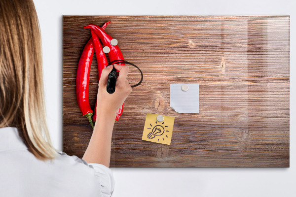 Decoratief glazen wandbord beschrijfbaar en magnetisch Een praktisch prikbord voor notities en foto's.