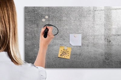 Decoratief glazen wandbord beschrijfbaar en magnetisch Een modern prikbord voor het ophangen van foto's.