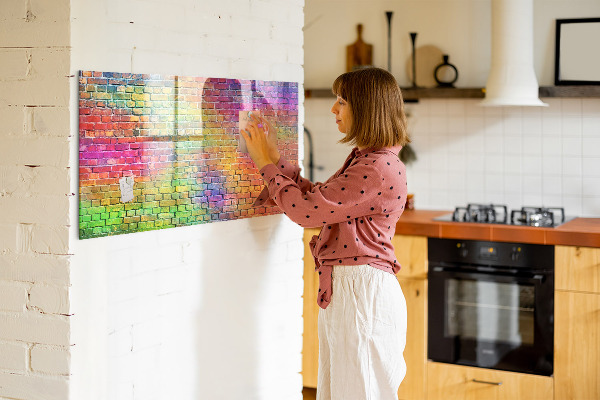 Decoratief glazen wandbord beschrijfbaar en magnetisch Een kleurrijke muur met ruimte voor foto's