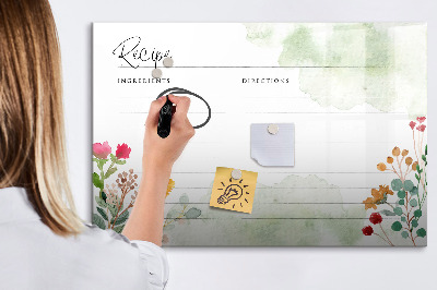 Decoratief glazen wandbord beschrijfbaar en magnetisch Een creatief prikbord voor recepten en herinneringen.
