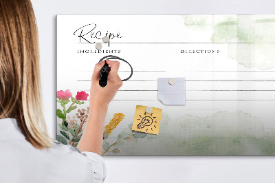Decoratief glazen wandbord beschrijfbaar en magnetisch Een creatief prikbord voor recepten en herinneringen.