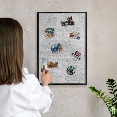 Wandbord voor magneten in een zwarte lijst Grijze textuur