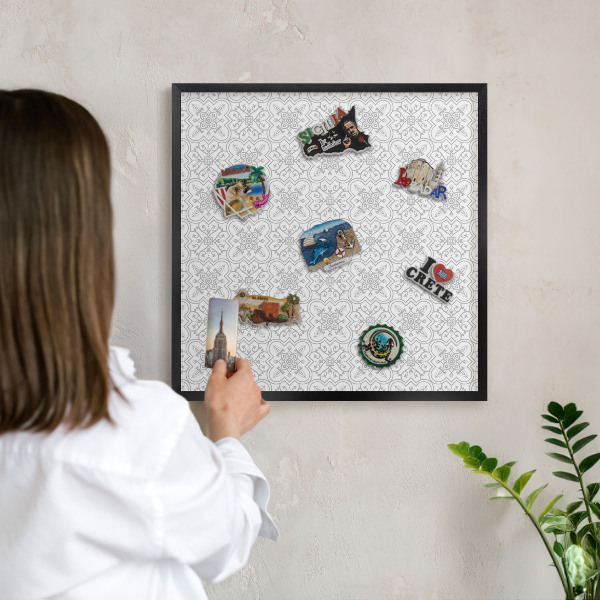 Wandbord voor magneten in een zwarte lijst Geometrische symmetrie