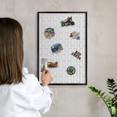 Wandbord voor magneten in een zwarte lijst Witte bakstenen