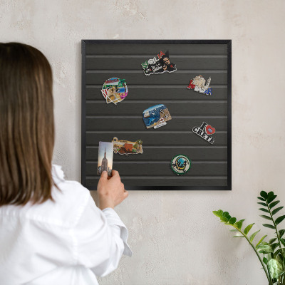 Wandbord voor magneten in een zwarte lijst Paneeltextuur