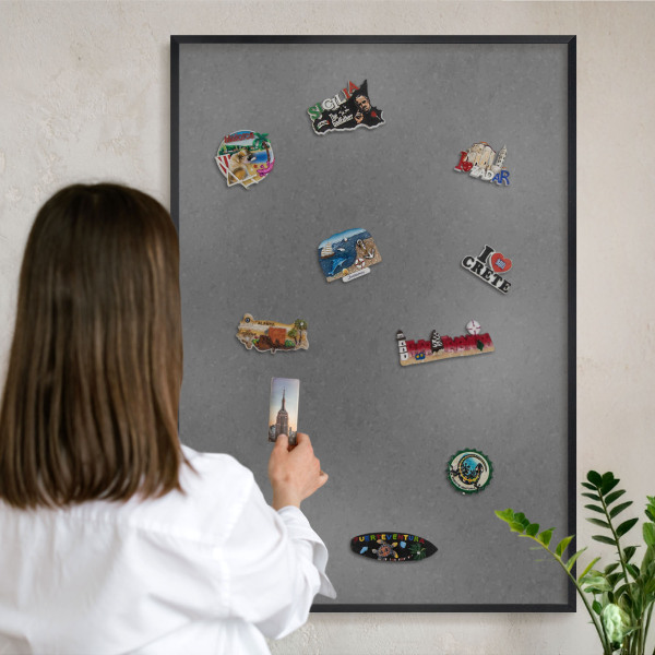 Wandbord voor magneten in een zwarte lijst Grijze textuur