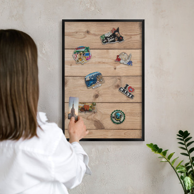 Wandbord voor magneten in een zwarte lijst Houtstructuur