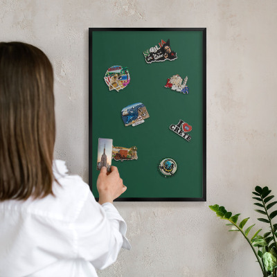 Wandbord voor magneten in een zwarte lijst Flesgroen