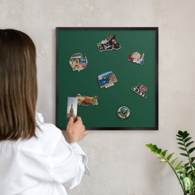 Wandbord voor magneten in een zwarte lijst Flesgroen