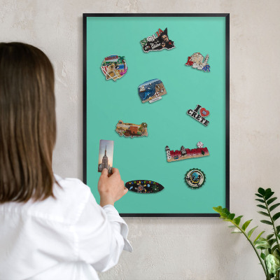 Wandbord voor magneten in een zwarte lijst Sterke munt