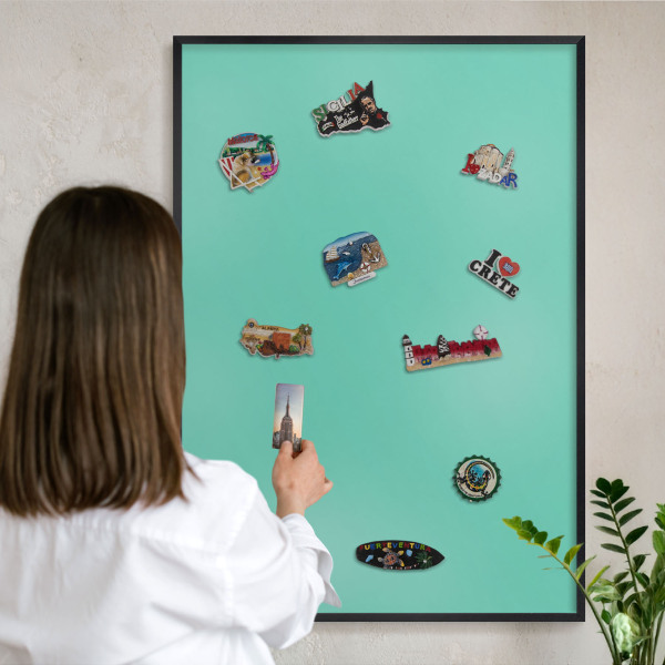 Wandbord voor magneten in een zwarte lijst Sterke munt