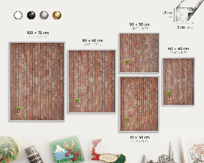 Decoratief metalen magneetbord in een zilveren lijst Bakstenen muur