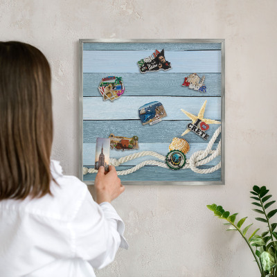 Magneetbord voor souvenir magneten met zilveren lijst Maritiem klimaat