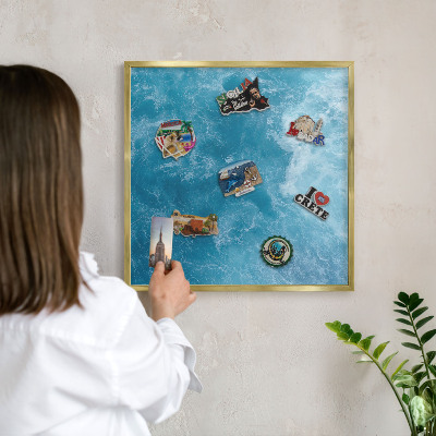 Metalen magneetbord met lijst in het goud Oceaangolven