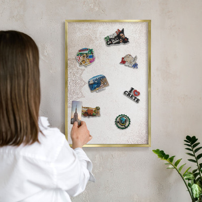 Metalen magneetbord met lijst in het goud Etnische patronen