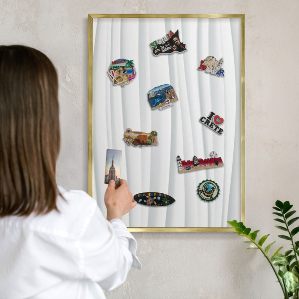 Metalen magneetbord met lijst in het goud Witte golven