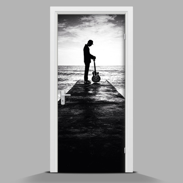 Zelfklevende deursticker Man met een gitaar