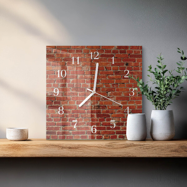 Vierkante glazen klok Bakstenen muur