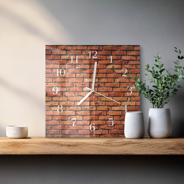 Vierkante glazen klok Bakstenen muur