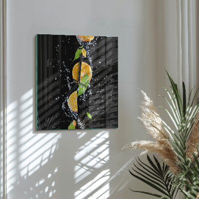 Vierkante glazen wandklok sinaasappels