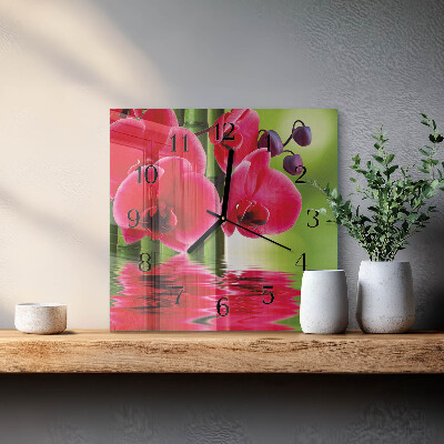 Vierkante glazen wandklok Orchidee