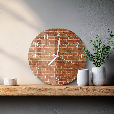 Ronde glazen klok Bakstenen muur