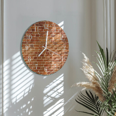 Ronde glazen klok Bakstenen muur