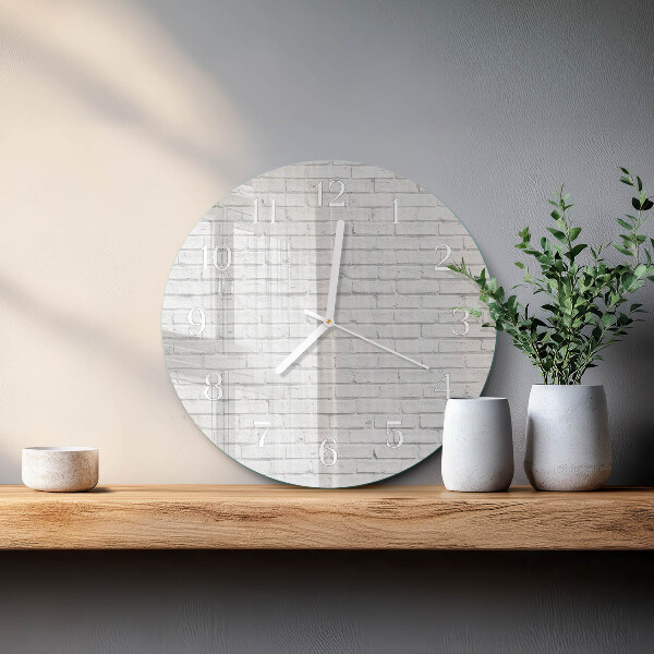 Ronde glazen klok Bakstenen muur