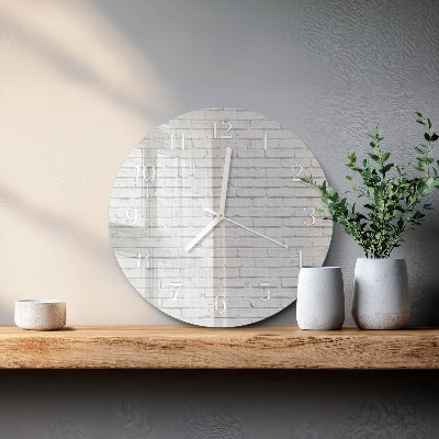 Ronde glazen klok Bakstenen muur